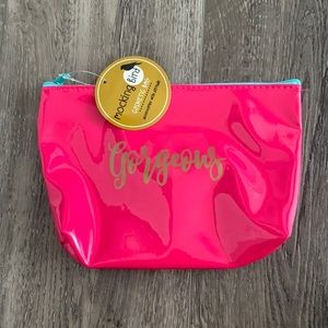 Pink and teal “gorgeous” makeup bag.
